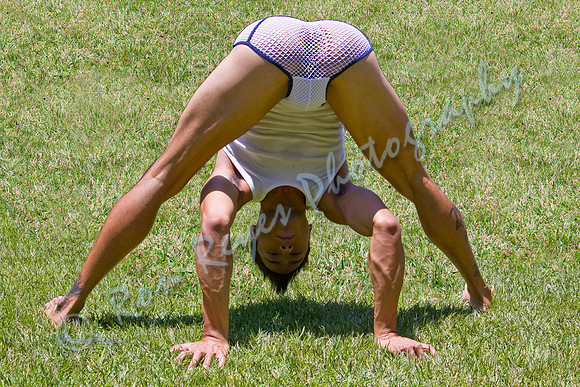 The Gymnast Stretches Toward Uranus